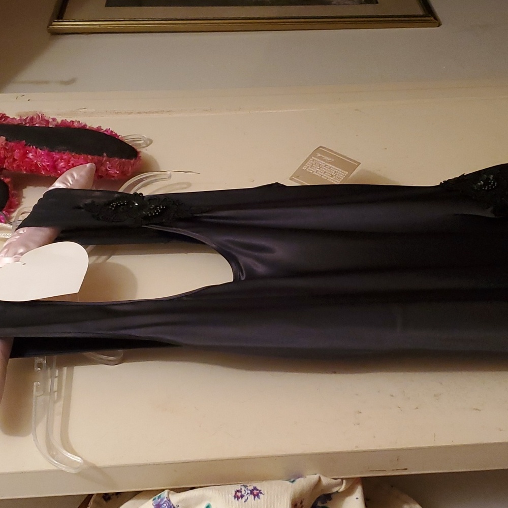 Black silk night gown half-raised by Blanche